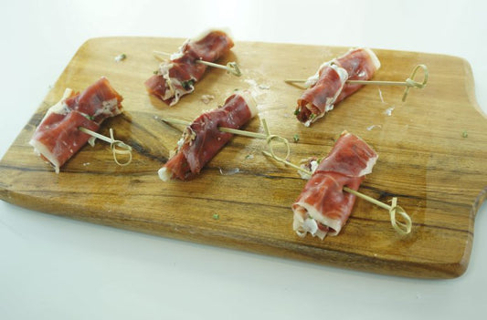Petits roulés au jambon ibérique & fromage frais à la ciboulette